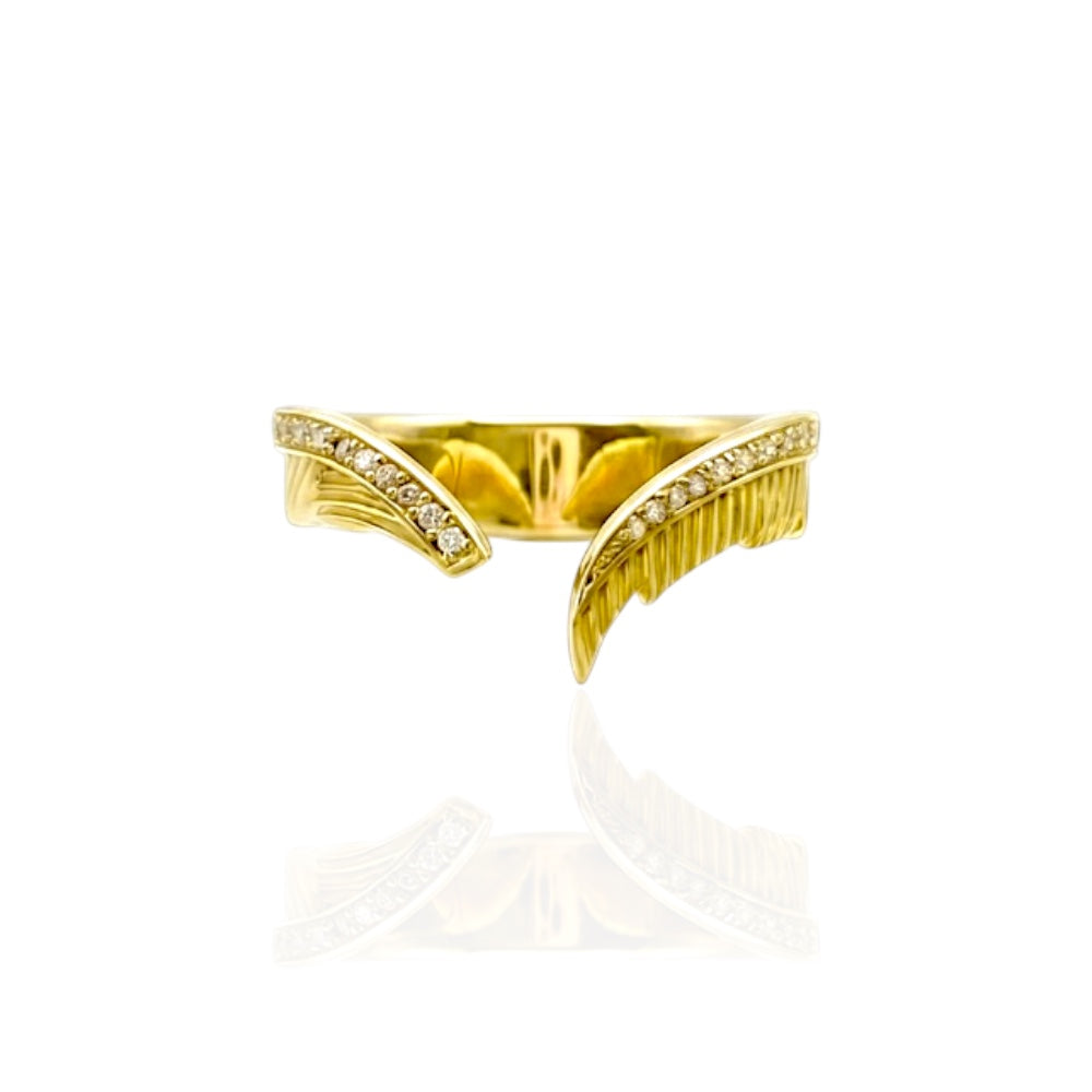 Gold unique feather ring with diamond accents on a white background