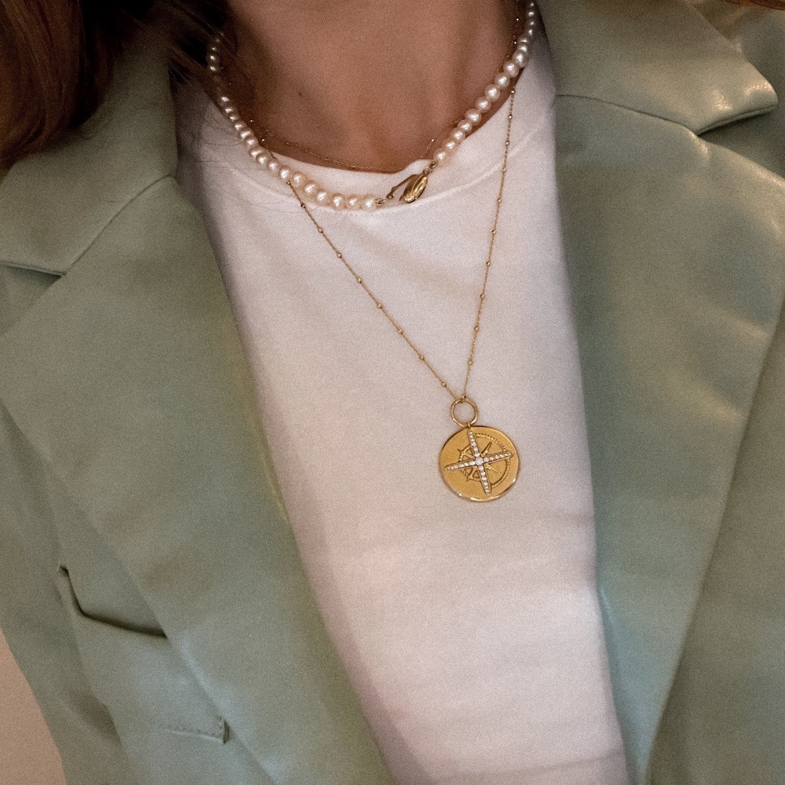 A woman wearing Sabine Pearl Necklace