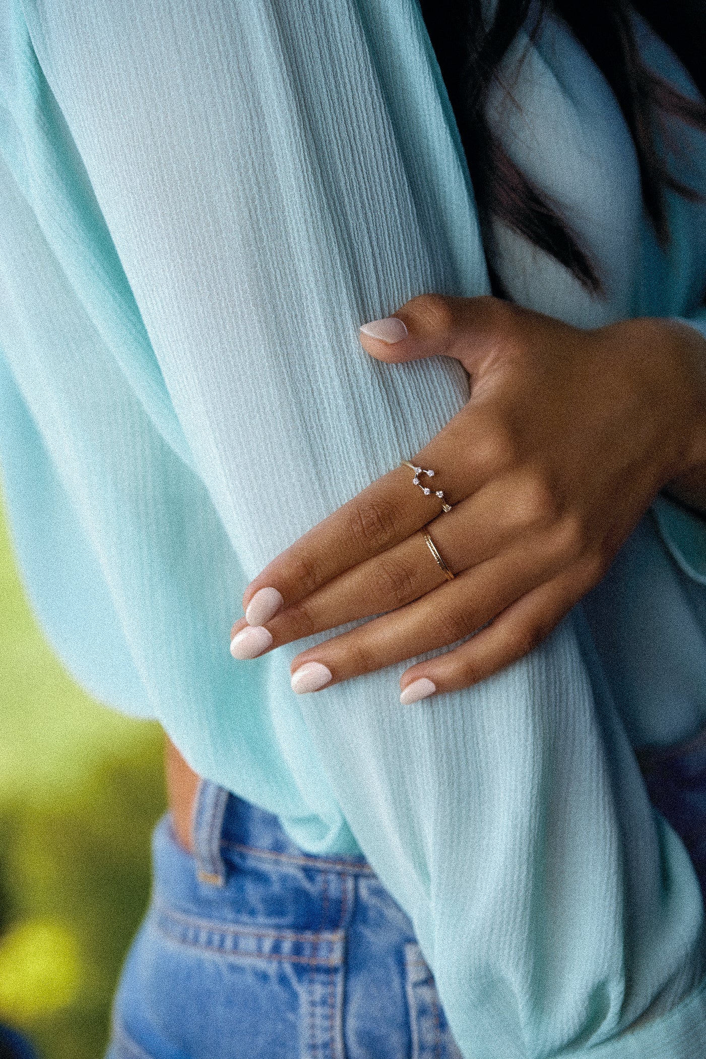 A woman wearing Zodiac Constellation Ring