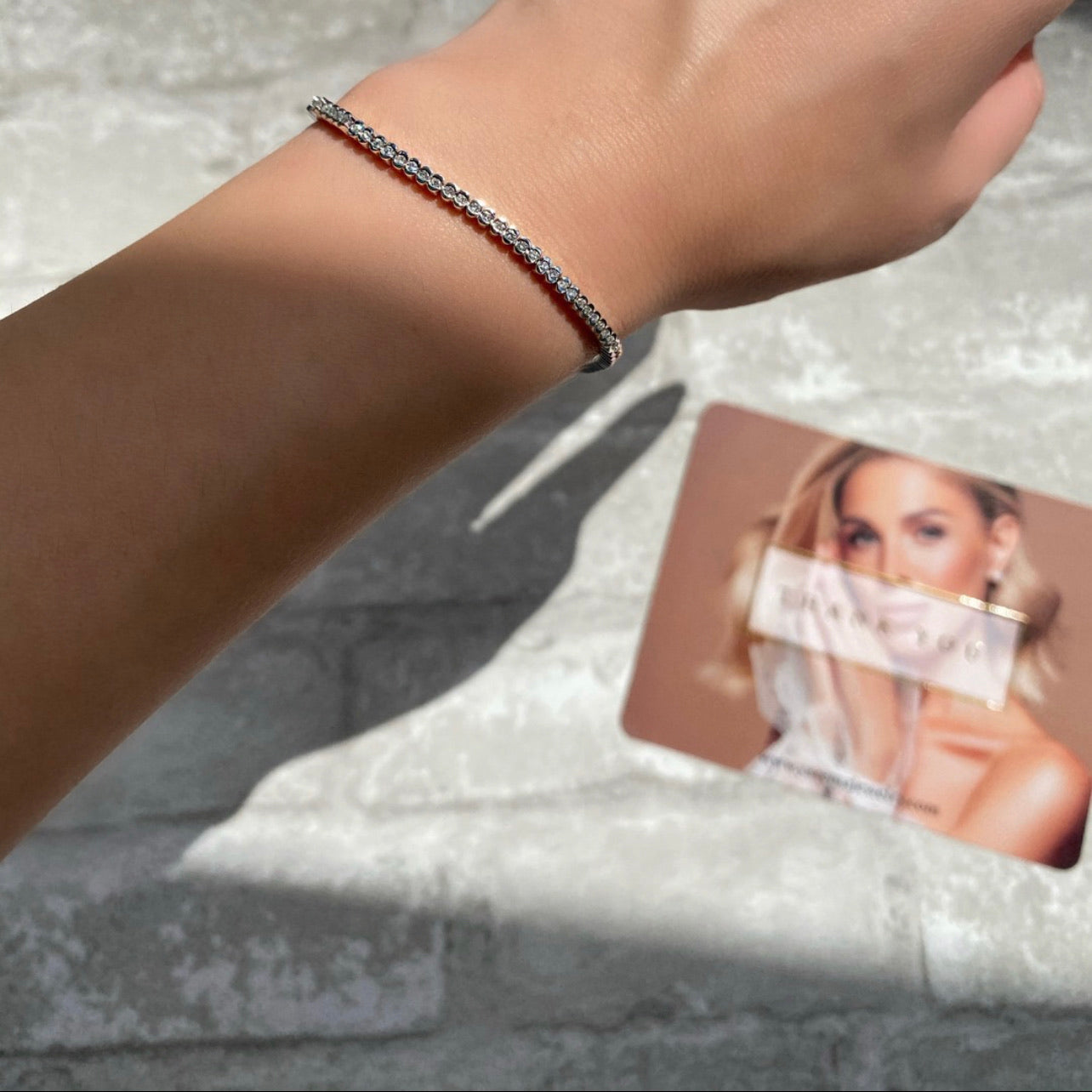 14k Gold 1ct Diamond Tennis Bracelet on a woman's wrist