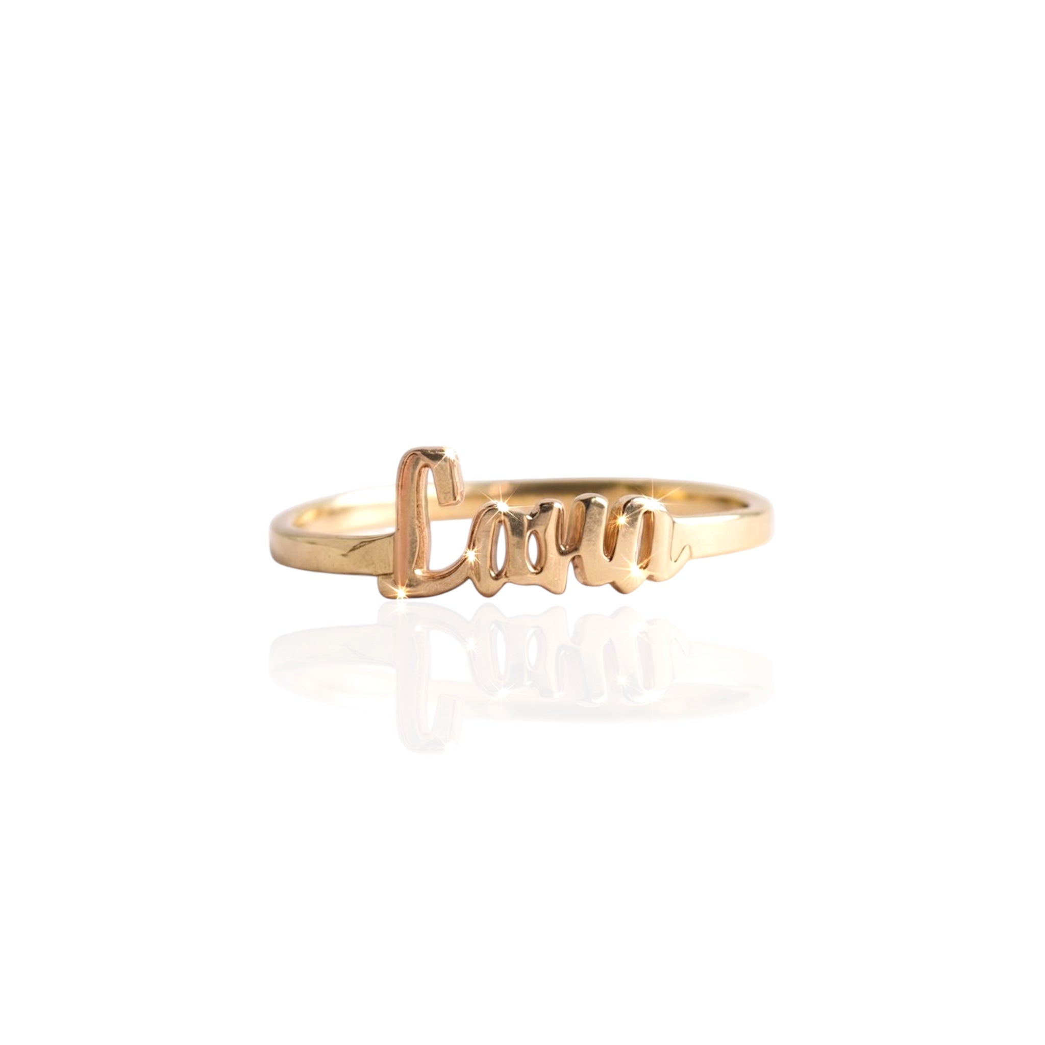 Gold ring with 'Lana' engraving on a white background