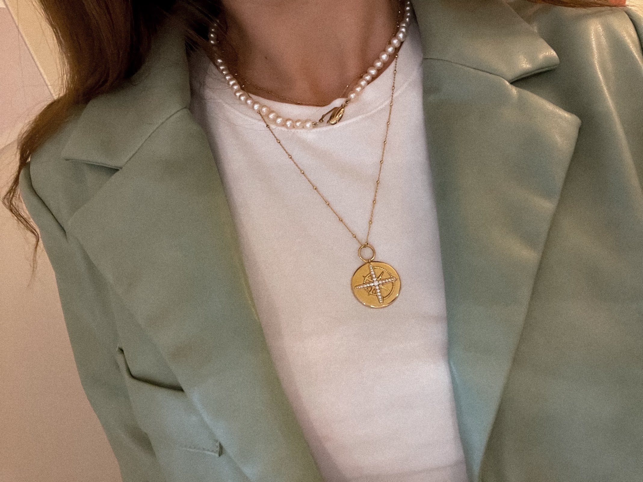 A  woman wearing Sabine Pearl Necklace