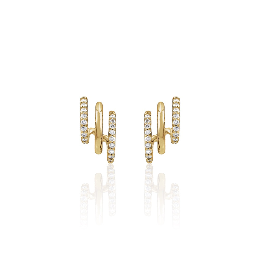 Gold earrings with diamond accents on a white background