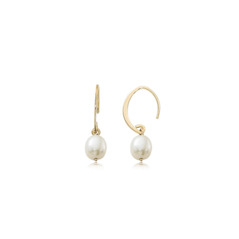 small pearl earrings on a white background made with 14k yellow gold